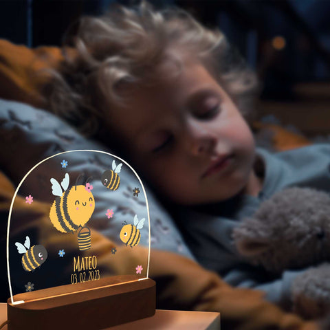Dziecięca lampka nocna LED z drewnianą podstawką, wzór pszczółka