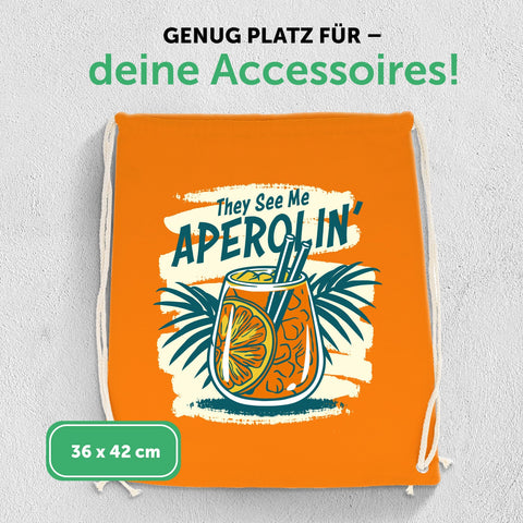Kolorowy worek gimnastyczny z nadrukiem DTF - They see me Aperolin